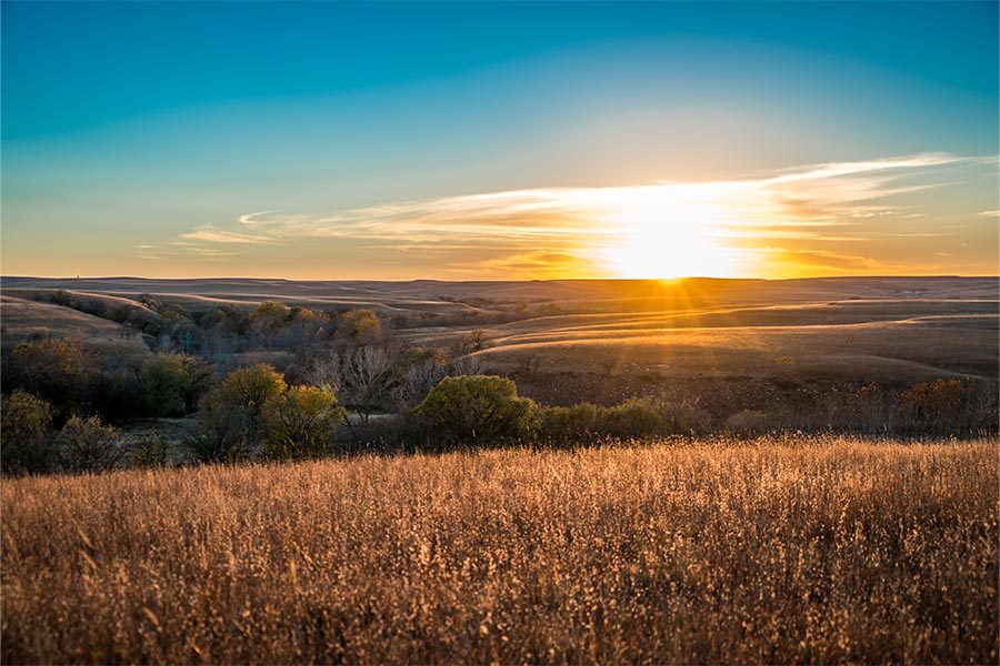 Contact - Scenic View of the Flint HIlls in Kansas During Sunset