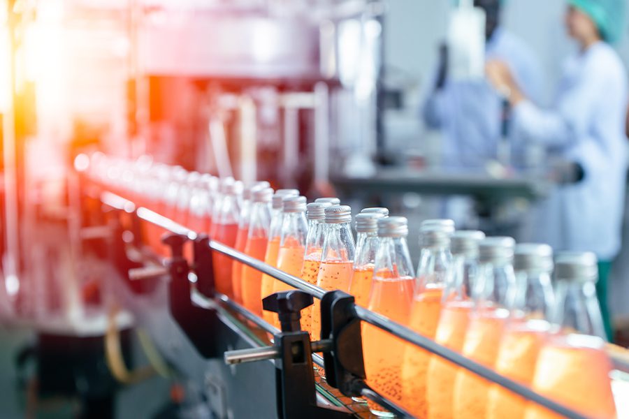 Beverage Manufacturing Insurance - A Production Line of Fruit Juice in a Juice Factory